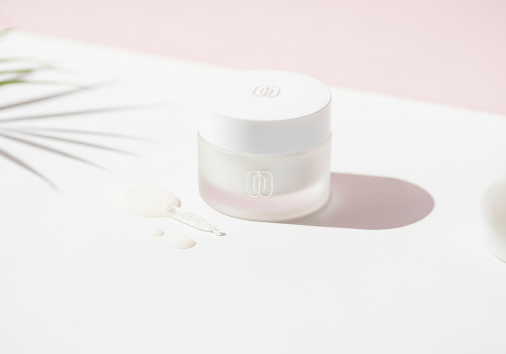 Simple skincare moisturizer jar on clean white background - anti-aging and wrinkle prevention blog post for sensitive Australian skin.